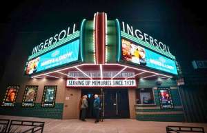 Thumbnail photo of The newly renovated and illuminated Ingersoll marquee, and the front doors to the theater