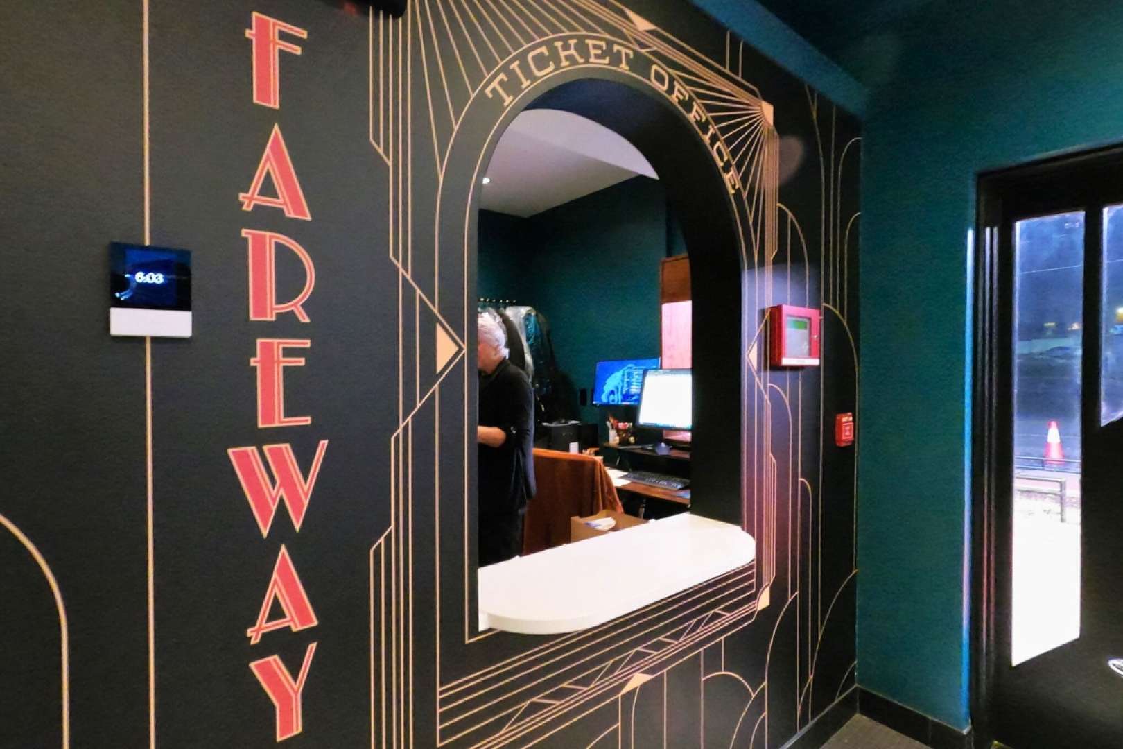 Photo of Fareway Box Office at the Ingersoll with a member of staff in the office