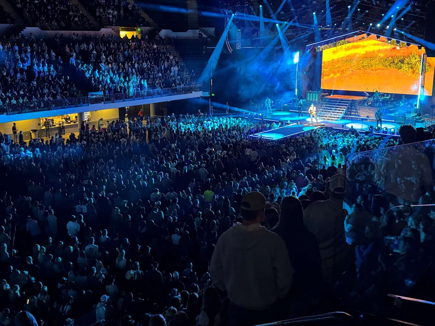 Photo of Parker McCollum Concert Cedar Rapids AlliantEnergy Powershouse showing artist playing to a packed arena