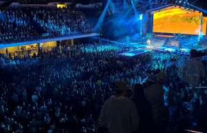 Thumbnail photo of Parker McCollum Concert Cedar Rapids AlliantEnergy Powershouse showing artist playing to a packed arena