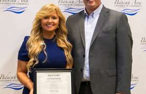 Thumbnail photo of Sales manager of Paducah Convention Center Angela being named a Kentucky Colonel for her statewide leadership