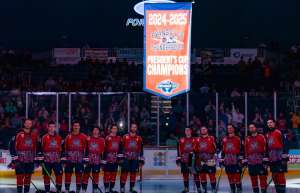 Thumbnail photo of Evansville Thunderbolts hockey team captured the SPHL Presidents Cup in May 2025,on the ice with the penant