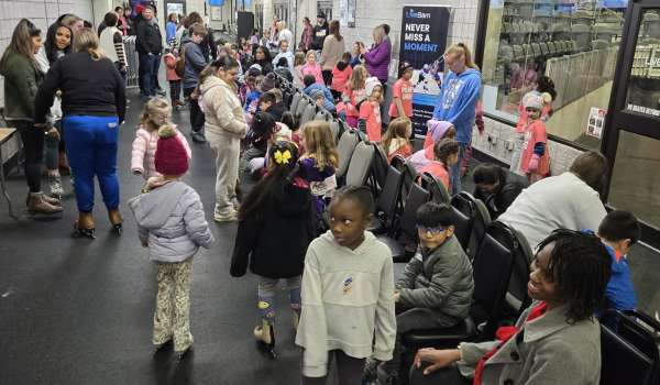 Image of Children getting ready to learn to skate