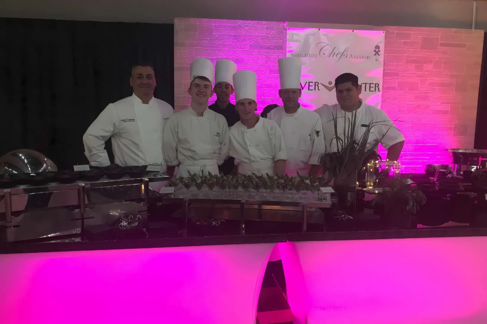 Photo of 6 chefs in whites and hats at the River Center