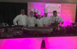 Thumbnail photo of 6 chefs in whites and hats at the River Center