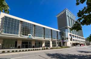 Thumbnail photo of Alliant Entegy Power House exterior and double tree hotel