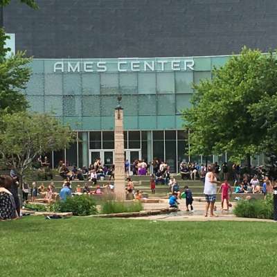 Exterior Shot of the Ames Center main entrance and lawn