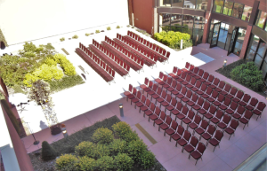 Thumbnail photo of Aerial view of chairs lines up outside
