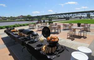 Thumbnail photo of Bridge View Center Outdoor Plaza set up with buffet for a reception