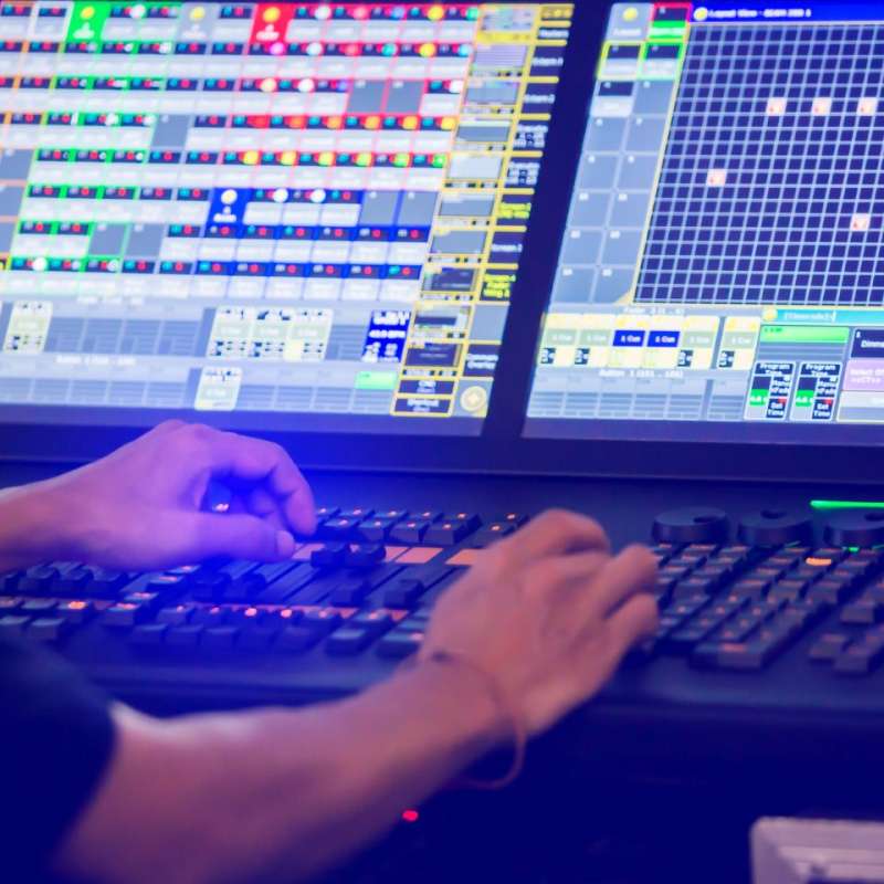 Man working on soundboard