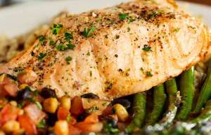 Thumbnail photo of white fish over a bed of green beans and corn