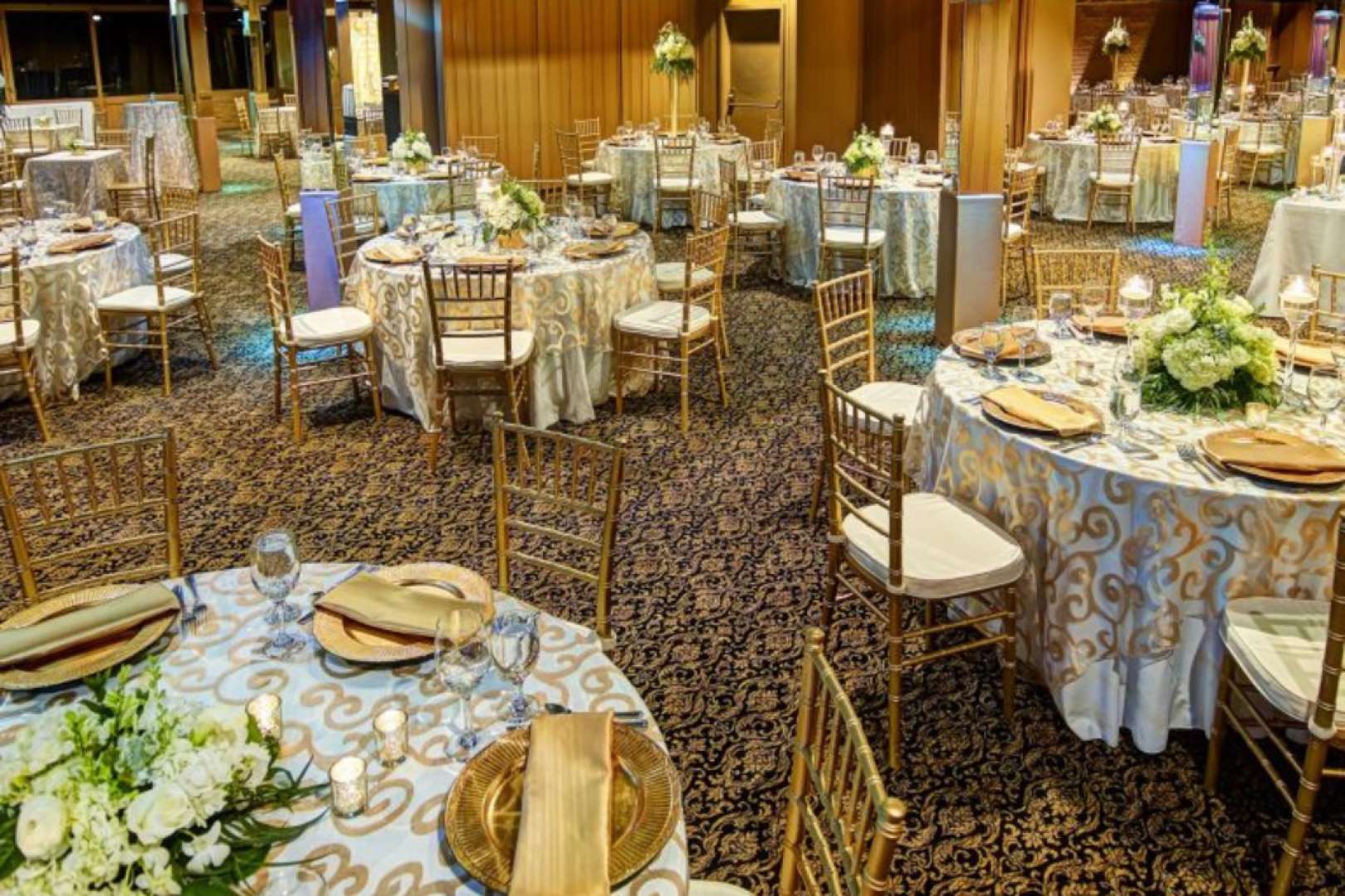 Photo of Tables set up for a wedding banquet