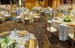 Thumbnail photo of Tables set up for a wedding banquet