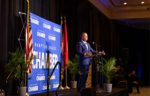 Thumbnail photo of Chesapeake Convention Center Hampton Roads Chamber Presentation with person on stage