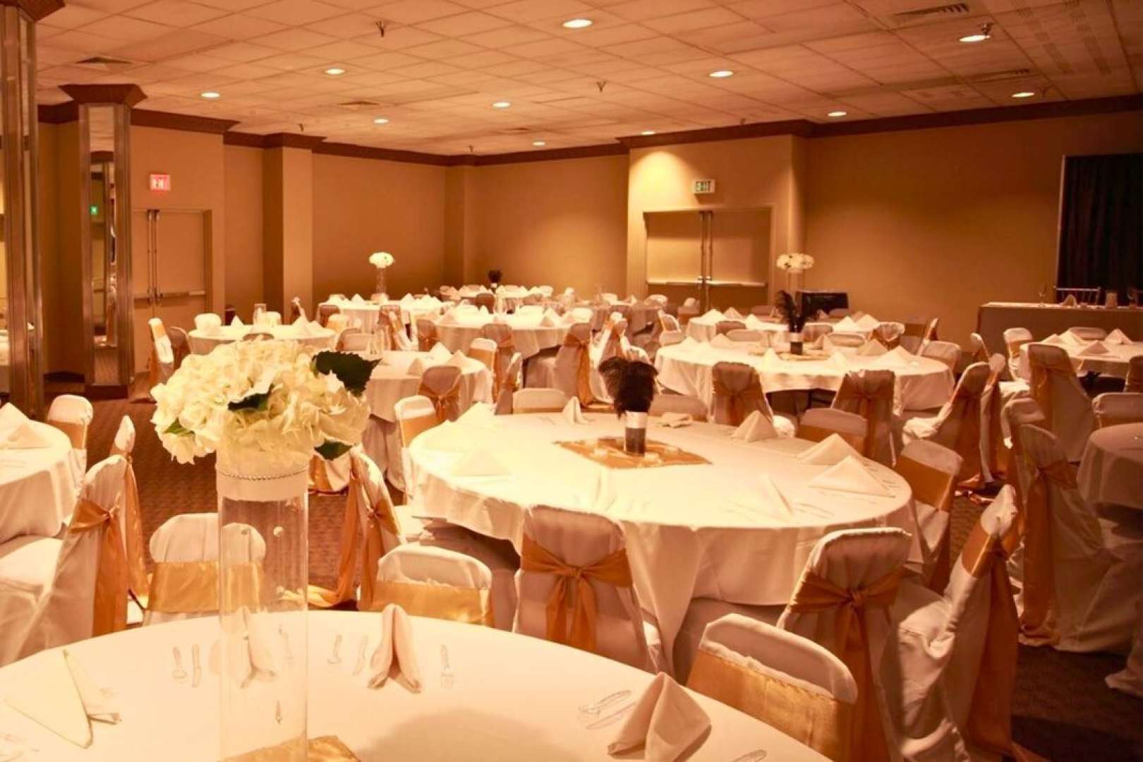 Photo of Hills Festival Hall set with round tables for a gala or wedding