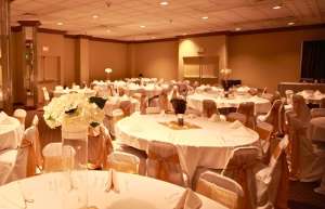 Thumbnail photo of Hills Festival Hall set with round tables for a gala or wedding