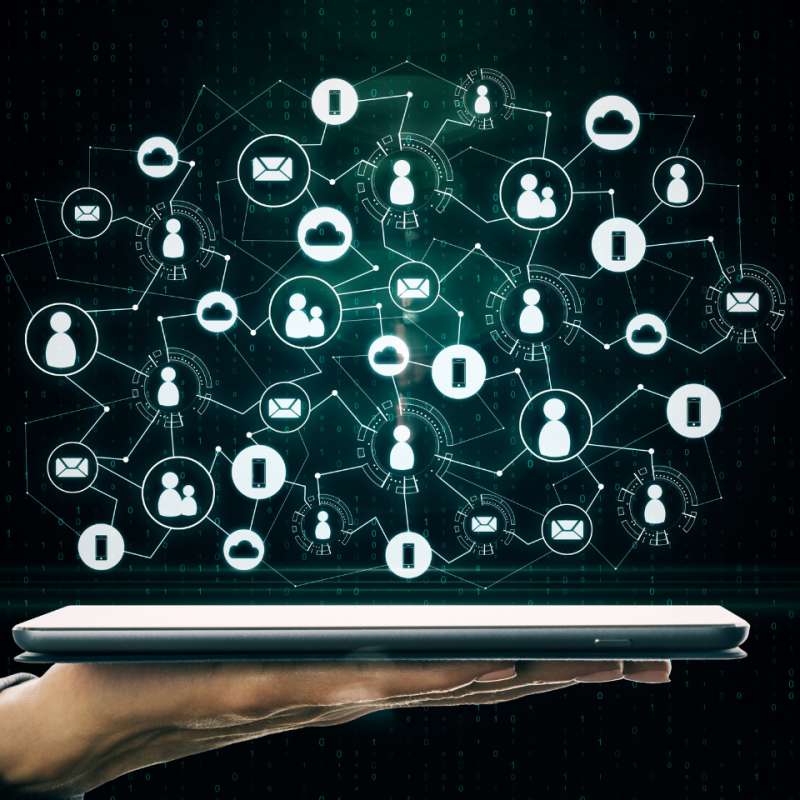 Web of icons representing HR hovering over a digital tablet