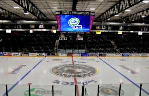 Thumbnail photo of Jumbotron reading ImOn Ice suspended above the Ice Rink