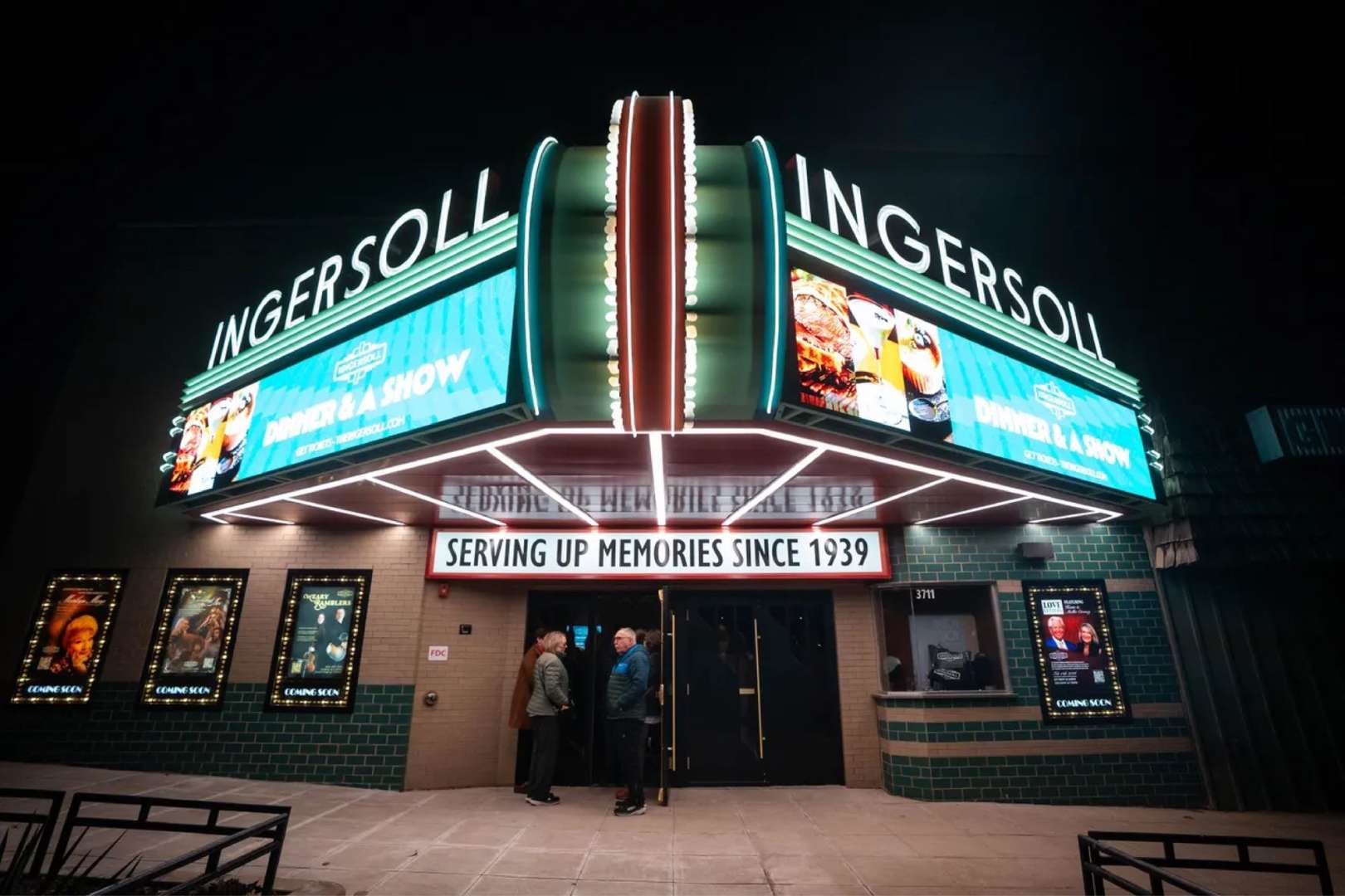 Photo of Illuminated Ingersoll marguee and front doors of the theater