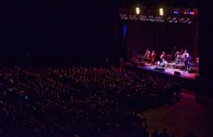 Thumbnail photo of  Audience watching a  show on stage at the Retter & Company Theatre  at Toyota Center