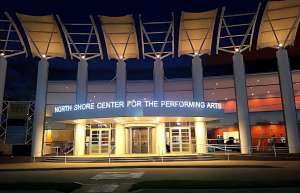 Thumbnail photo of Exterior shot of the North Shore Center for the Performing Arts marquee at night