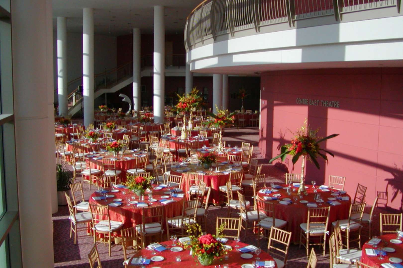 Photo of Lobby of the North Shore Center for the Arts set up for a gala dinner with round tables