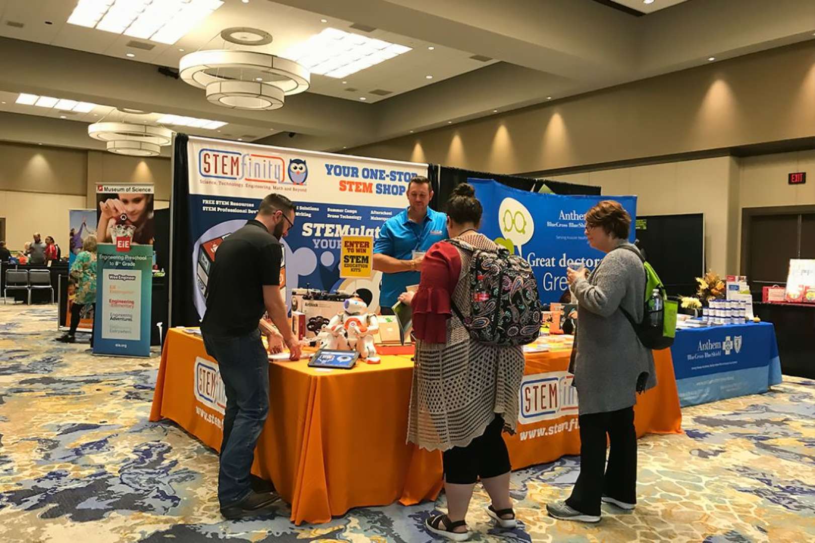 Photo of School kids attend a STEM Trade Show at One National Events Plaza