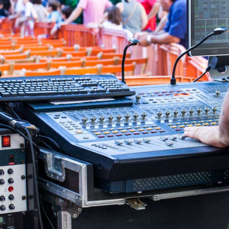 A sound board at an outdoor venue
