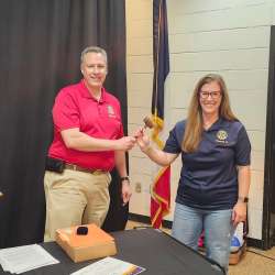 Photo of OTTUMWA ROTARY CLUB LEADERSHIP TRANSITION BRIDGE VIEW CENTER’S EXECUTIVE DIRECTOR SCOTT HALLGREN PASSES TORCH