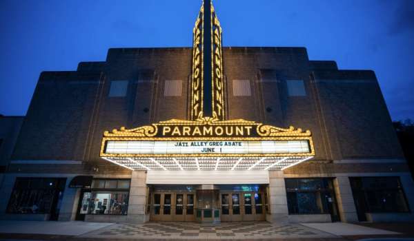 Exterior Shot of the Paramount Arts Center Marquee lit up in Ashland KY with the words Jazz Alley Greg Abate June 1 displayed on the marquee