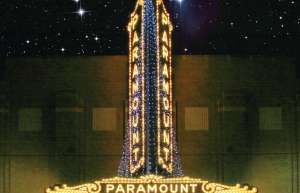 Thumbnail photo of A shot of the illuminated Paramount Arts Center Marquee in a winter sky with the words welcome to the Paramount displayed on the marquee