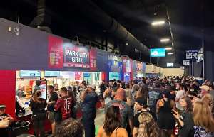 Thumbnail photo of Heartland Credit Union Arena people waiting in line for concessions stands