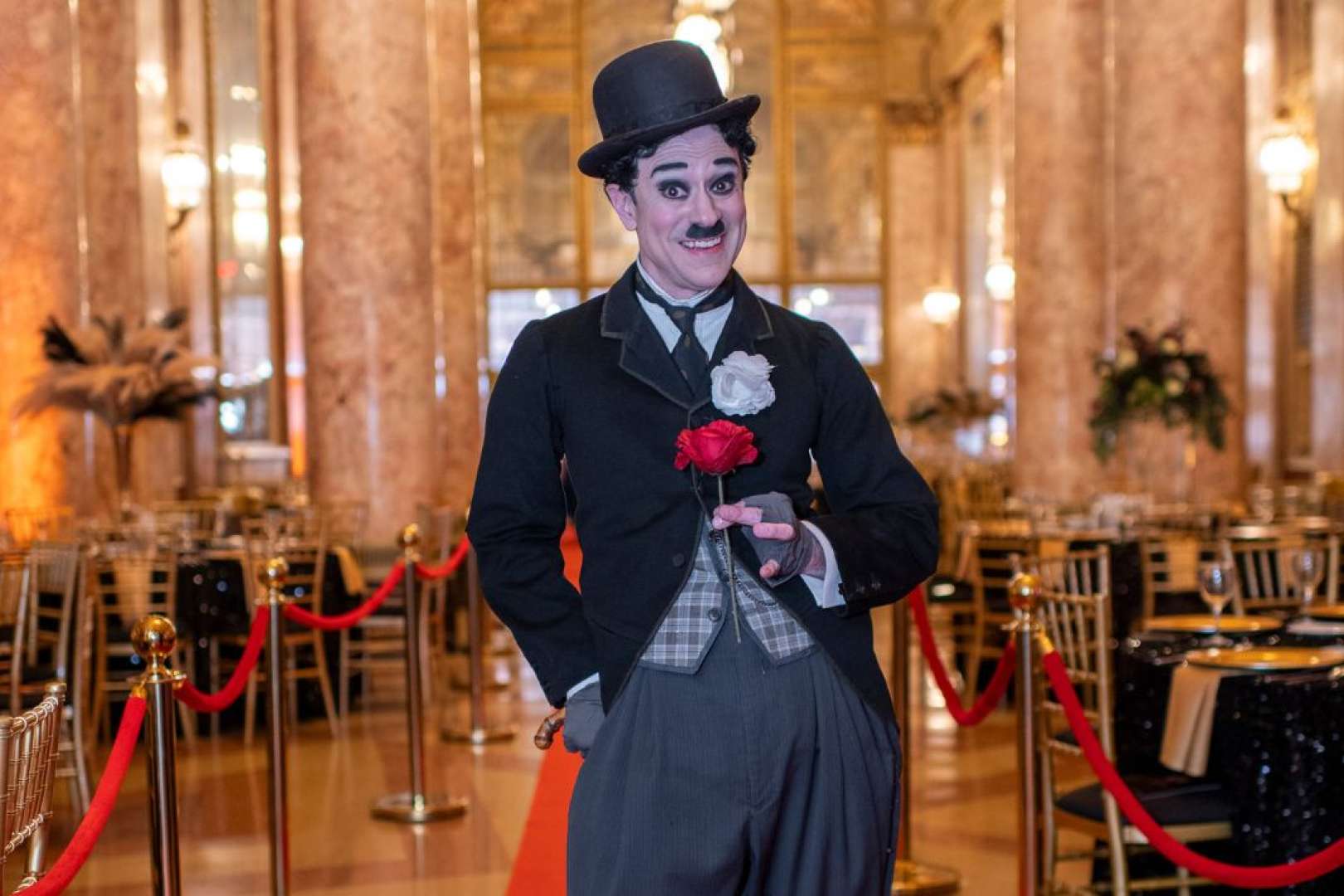 Photo of An actor dressed up as Charlie Chaplin at the Rialto Square 100th anniversary gala