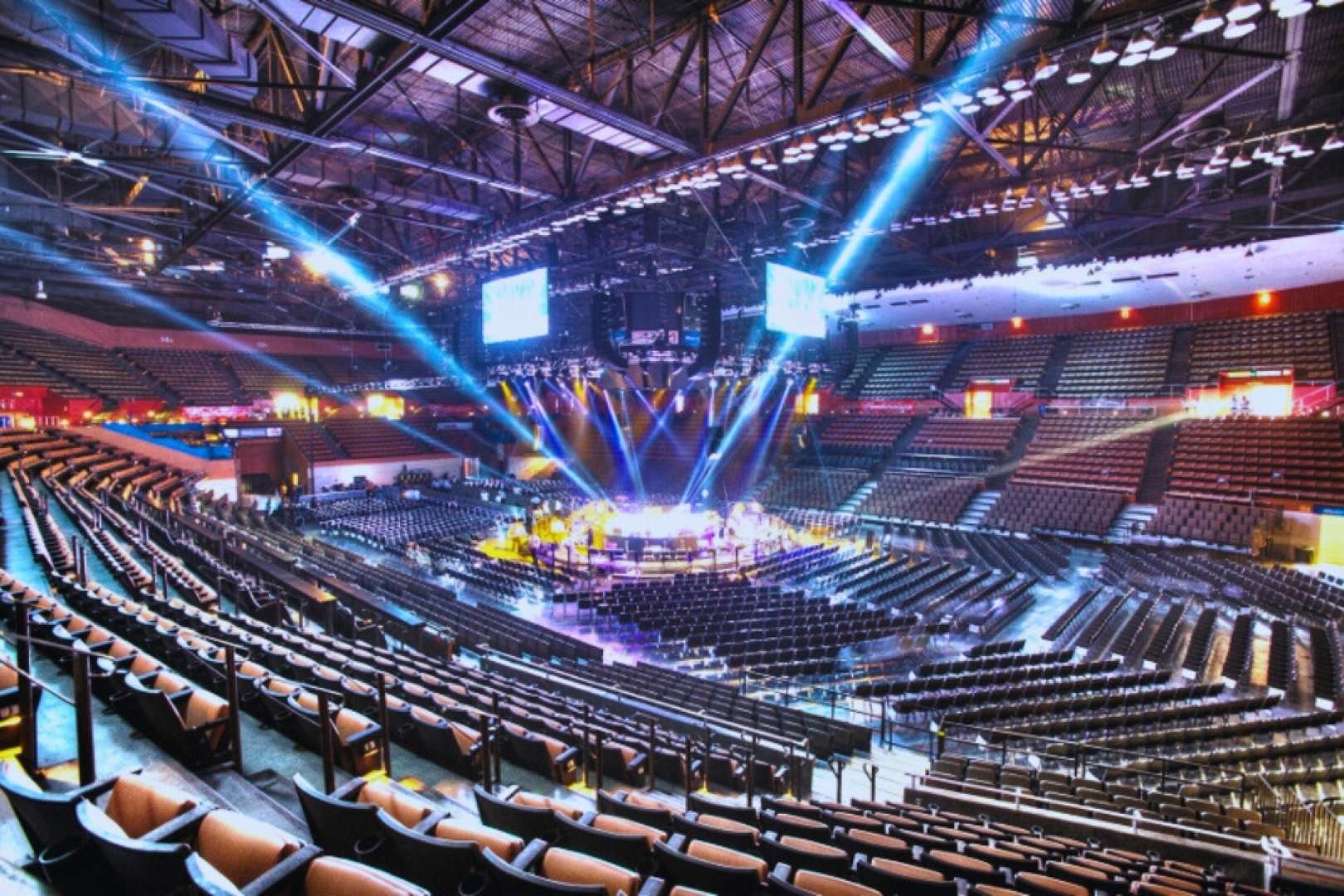 Photo of Empty Selland Arena with light show, testing before a concert