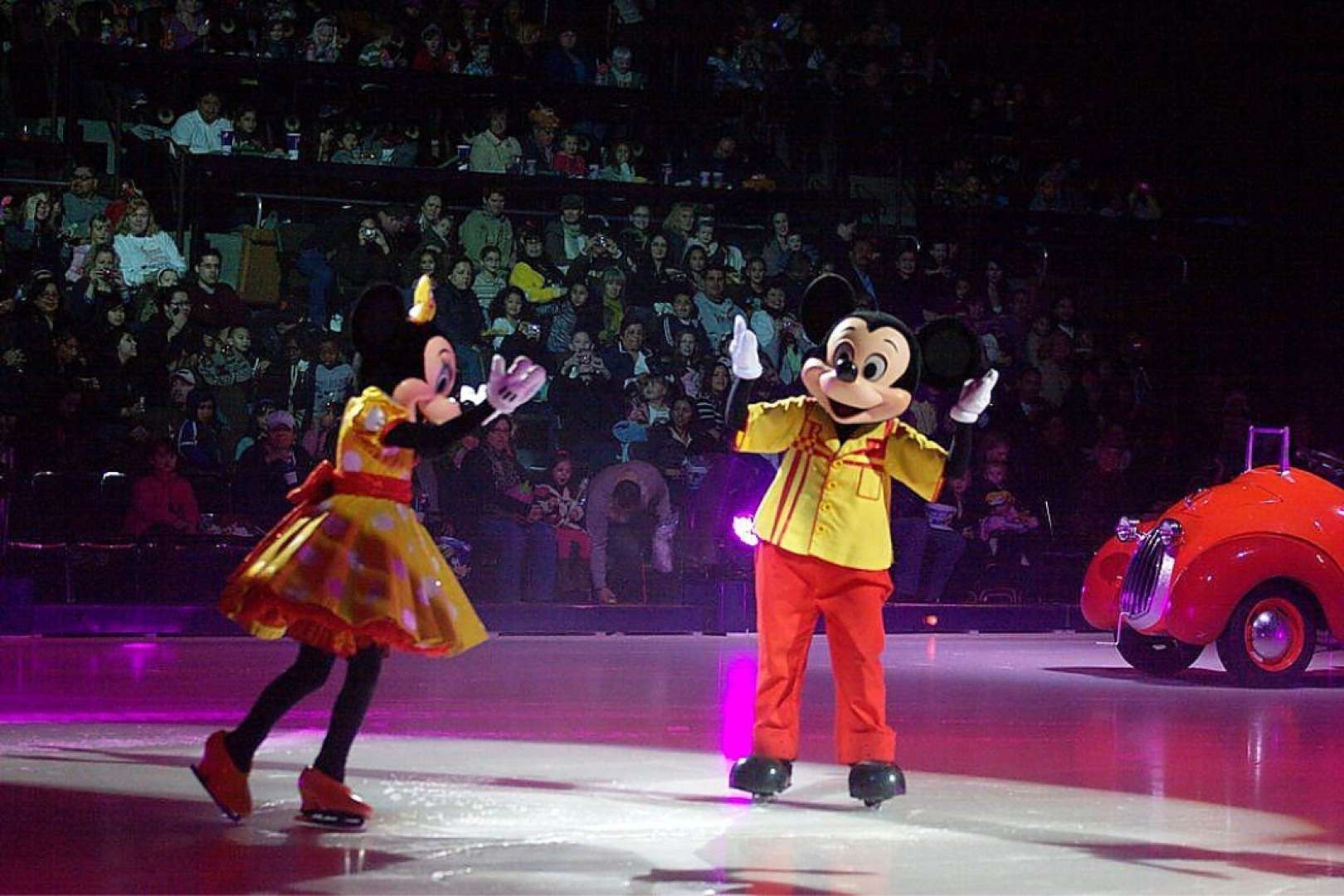 Photo of Mickey Mouse and Minnie Mouse from Disney on Ice skating at the Selland Arena