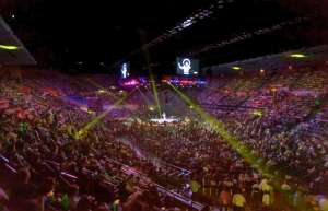 Thumbnail photo of Sold out concert in the 360 round format, view from the audience looking towards the stage