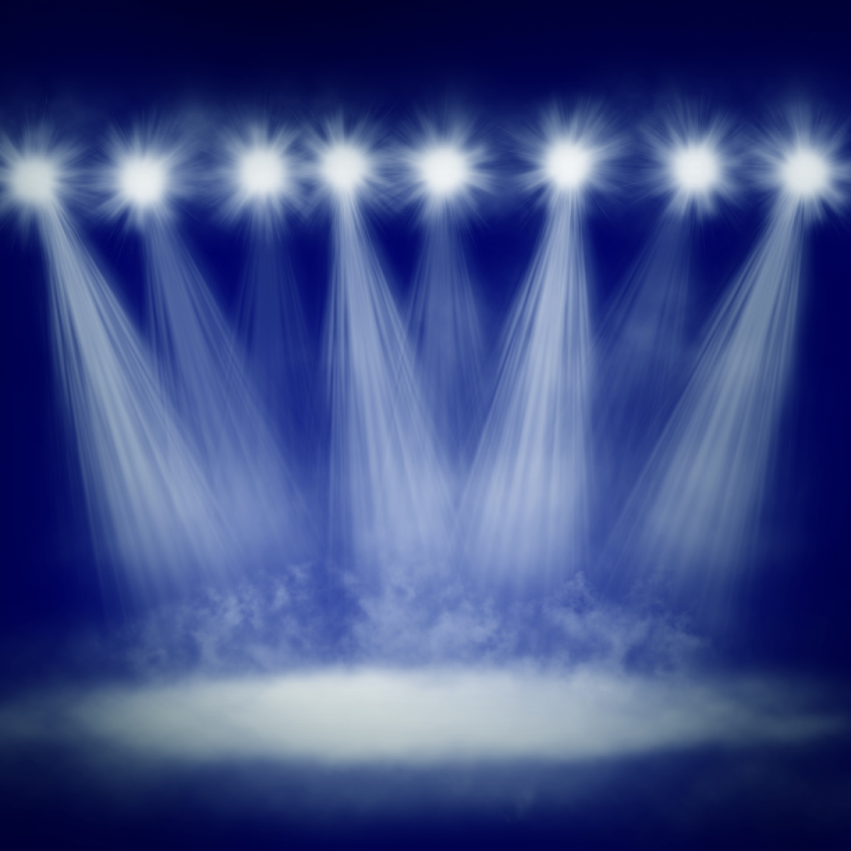 Blue background with spotlights as if on a stage