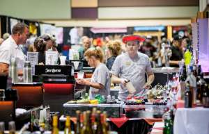 Thumbnail photo of 2 bartenders serving at an event at the Three Rivers Convention Center