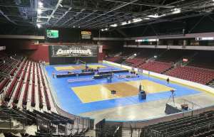 Thumbnail photo of United Wireless Arena hall set up for volleyball tournament