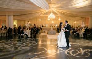 Thumbnail photo of Bride and Groom celebrating their first dance at a wedding reception at the Valdez Hall