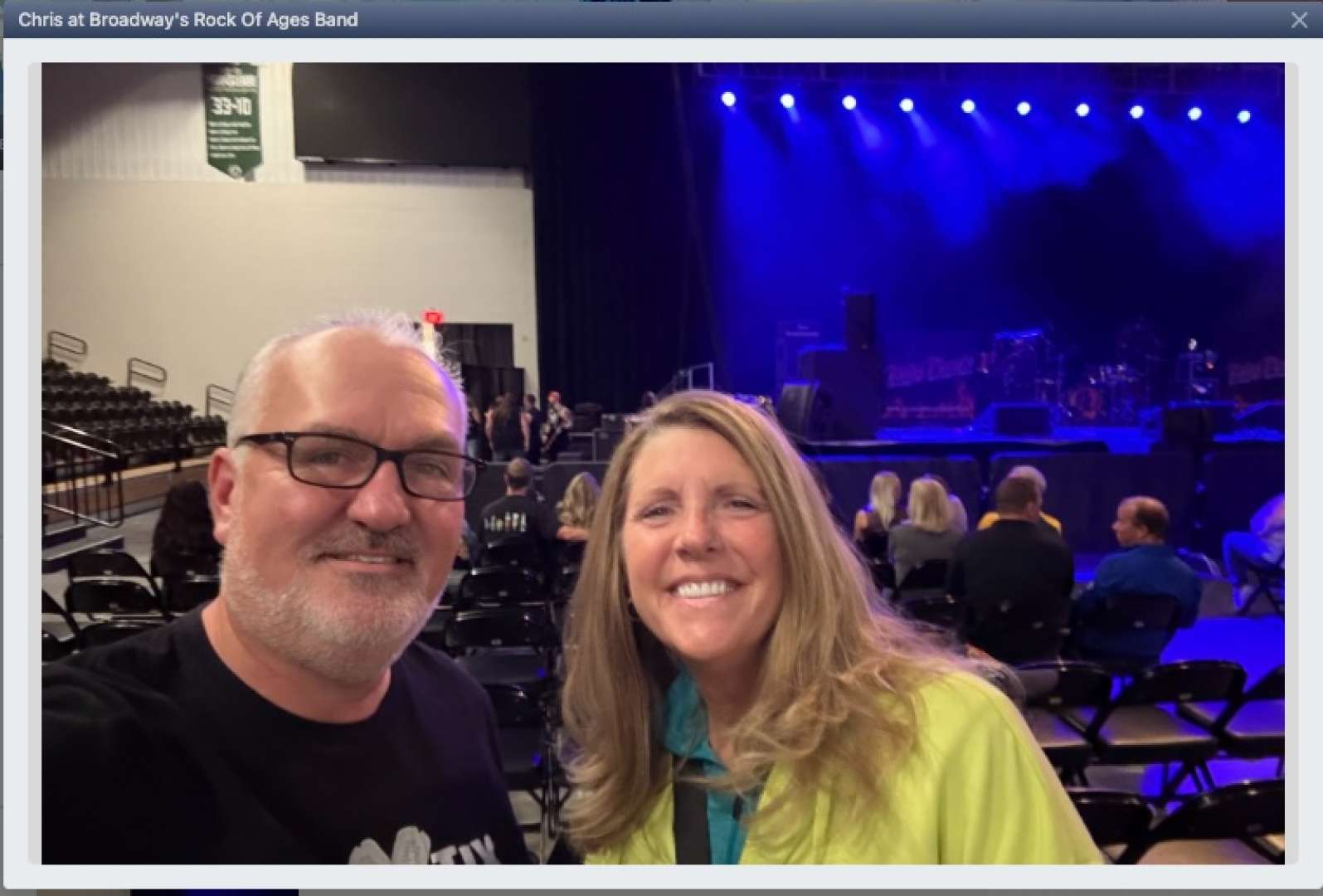 Photo of U.S Veteran Chris with a friend attending the Rock of Ages show at the Oshkosh Arena