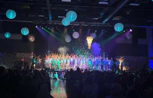 Thumbnail photo of Dance recital on stage viewed from Audience at Vicksburg Convention Center