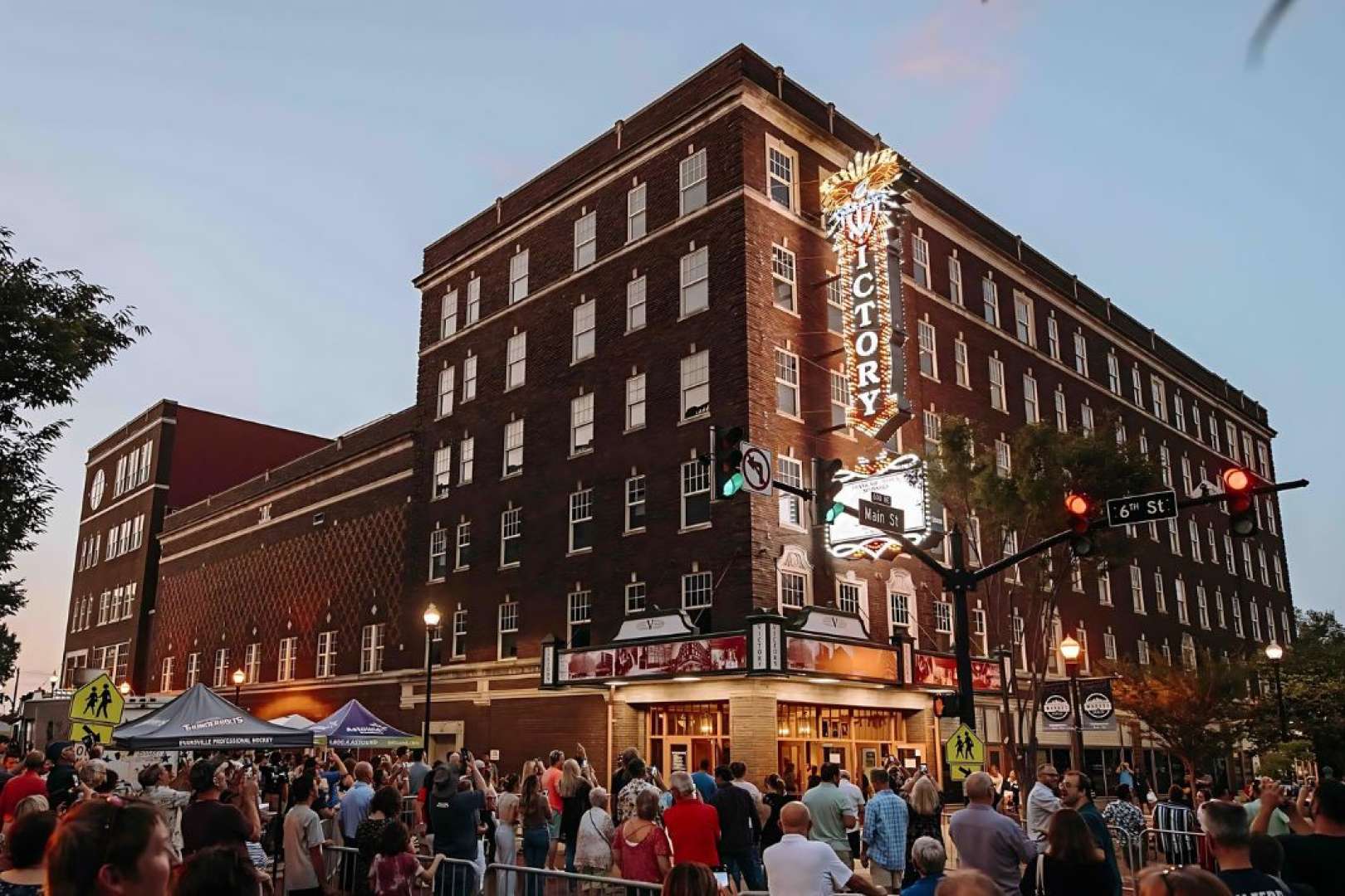 Photo of Victory Theatre a crowd gathered outside to see the unveiling of the new historic marquee
