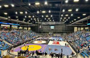 Thumbnail photo of A Wrestling tournament in progress at the HCU Arena in Park City KS