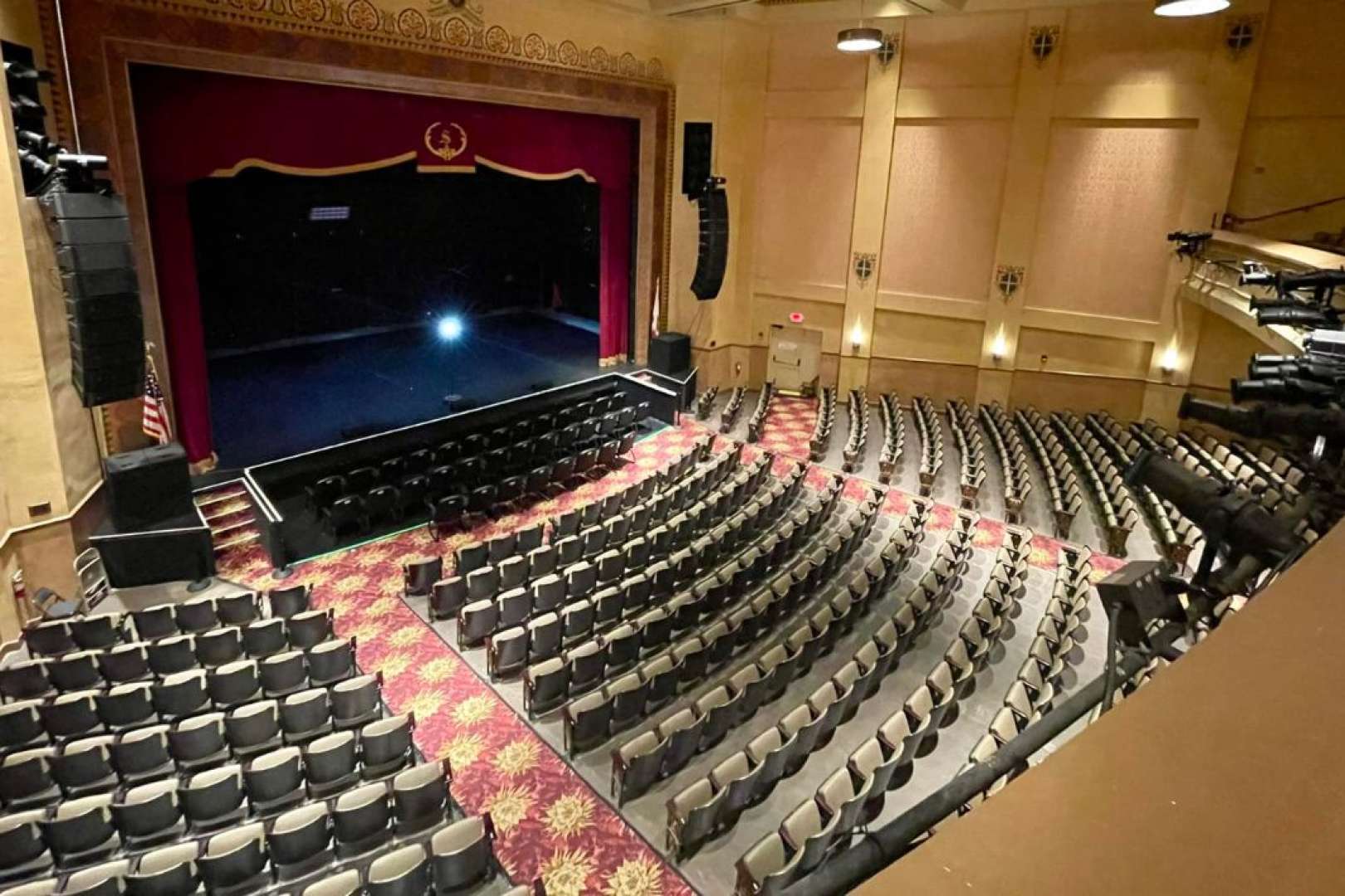 Photo of Internal shot of Sunrise Theatre in Fort Pierce from the balcony looking down on empty orchestra seating and stage.